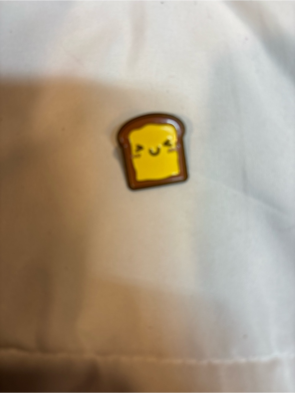 Cute Yellow Toast Enamel Pin for- Charming Snack Design approximate 1”